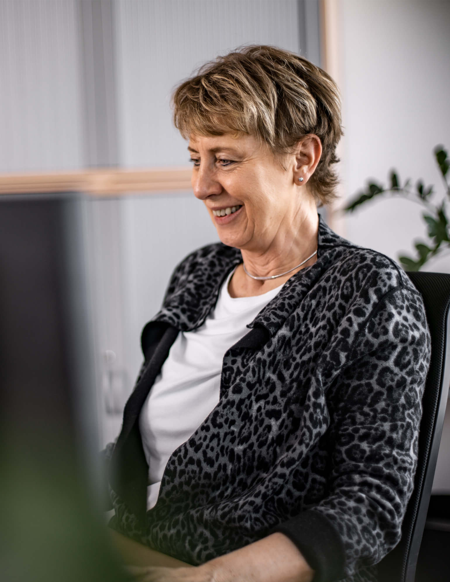 Woman in front of computer